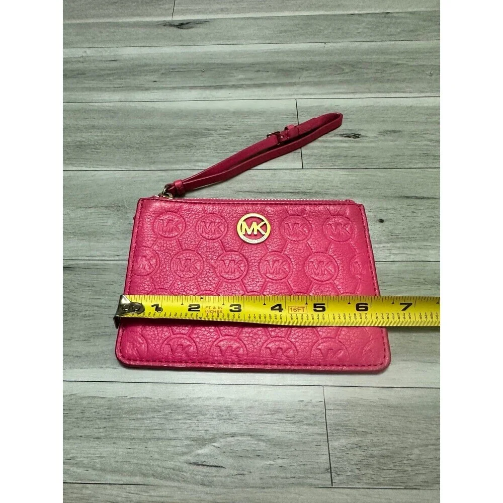Michael Kors Fuchsia Embossed MK Logo Wristlet with Gold Accent